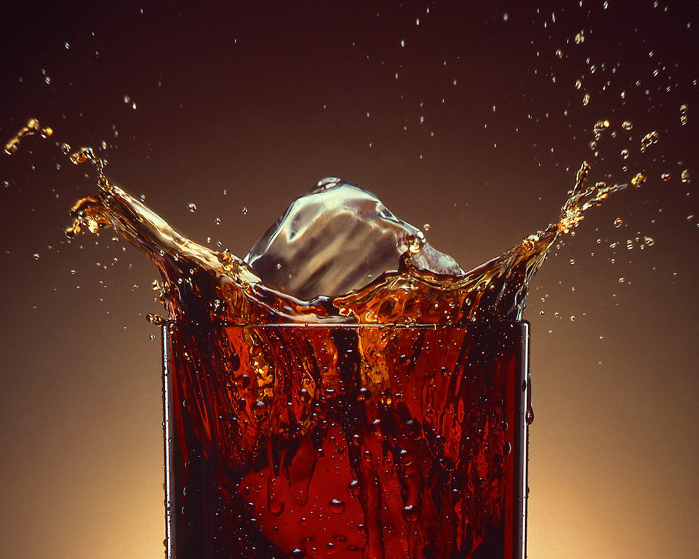 Pepsi Cola Glass Splash photo by Jens Johnson Photography. Premium food, beverage, and product photography for Connecticut and New York.