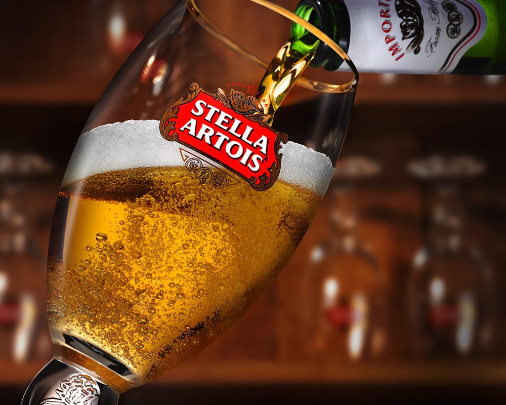 Stella Artois Beer pouring into a glass photo by Jens Johnson Photography. Premium food, beverage, and product photography for Connecticut and New York.